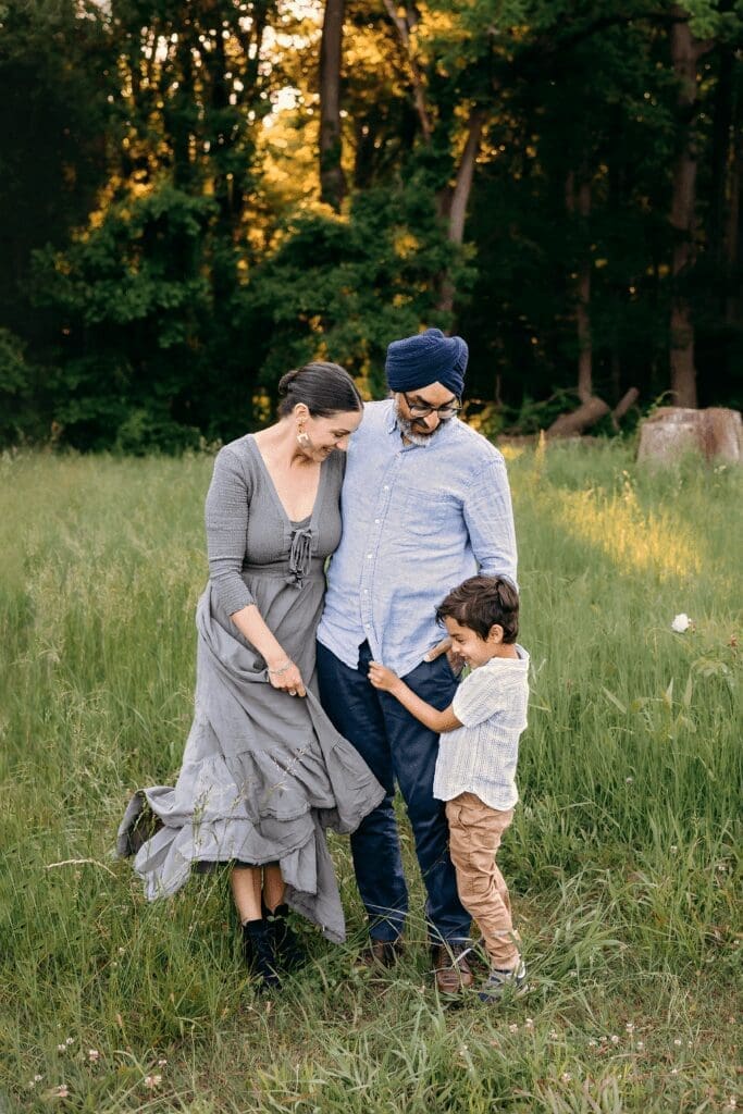 Snuggles, play, and laughter fill the air as a family enjoys Schwartz Peony Garden—capturing precious moments at Seneca Creek State Park.