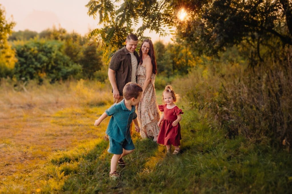 Family play in the field at Howard County Conservancy, Maryland